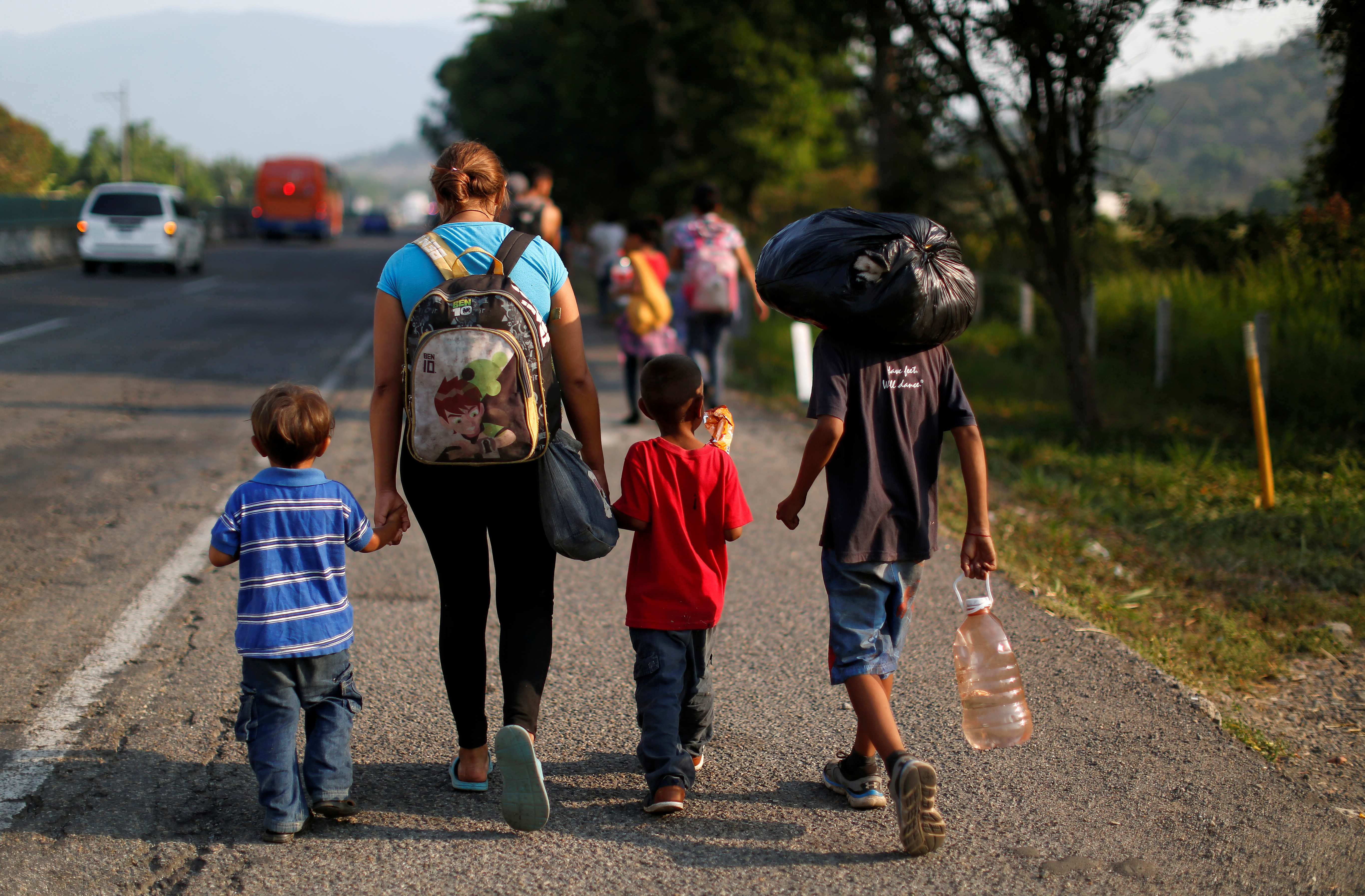 Children and families at border crossing